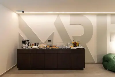 a kitchen with a counter with food on it at Mariette Rhodes Urban Suites in Rhodes Town