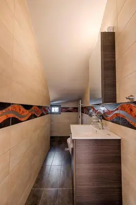 a bathroom with a sink and a toilet at Villa Pandesia in Kremasti