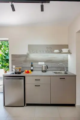 a kitchen with a sink and a counter top at Sokrates Studios in Afantou