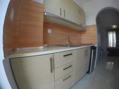a kitchen with a sink and a counter top at Yianna Studios in Faliraki