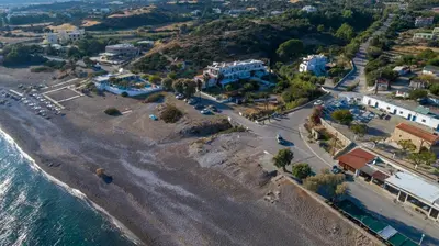 an aerial view of a beach near the water at Corafili Holiday Suites in Kiotari