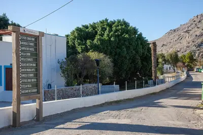 a sign on the side of a road at Villa Stamatis in Pefki Rhodes