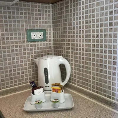 a coffee maker sitting on a counter in a kitchen at Fiore di Flora in Archangelos