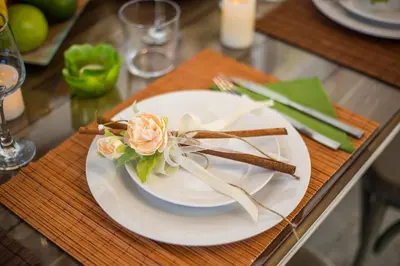 a plate with flowers on it on a table at La casa di Anna in Rhodes Town