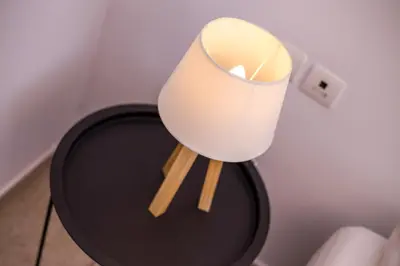 a lamp sitting on top of a table at Apartment Ivy Kallithea in Rhodes Town
