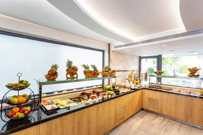 a buffet line with a lot of food on display at Rhodos Horizon City-Adults Only in Rhodes Town