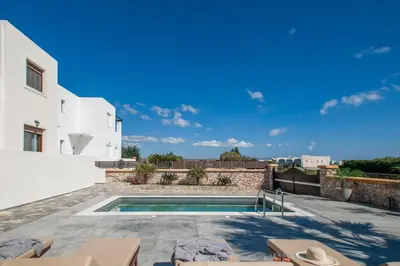 a swimming pool on the roof of a house at Costa Gennadi Villa in Gennadi