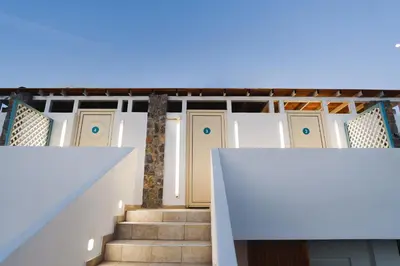 a staircase in a house with white walls at Mylos Luxury Escape in Faliraki
