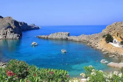 a group of boats in a large body of water at KALITHEA-HILLS VILLA with pool for 8 up to 12 IN RHODES TOWN in Rhodes Town