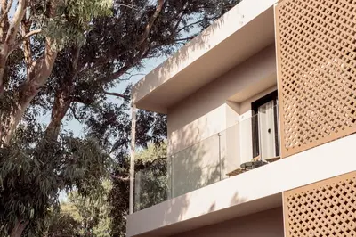 a view of the side of a house with a window at More Meni City Beach Rhodes in Rhodes Town