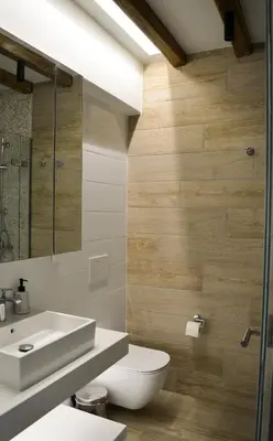 a bathroom with a white toilet and a sink at Haraki Blue Pearl Luxury studio in Haraki
