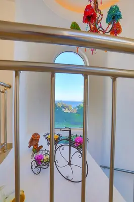 a room with a window with a view of the ocean at Villa Kivotos in Lardos