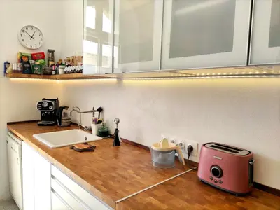a kitchen with a counter with a toaster and a sink at Romantic rooms with stunning sea view in Rhodes Town