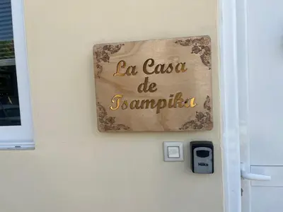 a sign on a door that reads la casa de jamaunta at La Casa de Tsampika in Koskinou