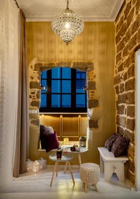 a living room with a table and a window at A33 Rhodes Old Town House in Rhodes Town