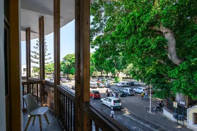 a balcony with a view of a parking lot at Casa Poli Suites in Rhodes Town