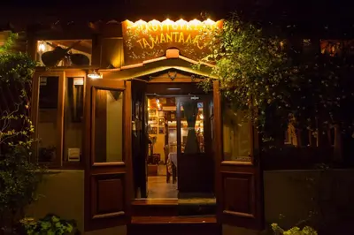 an entrance to a restaurant at night at Villa Kefi in Koskinou