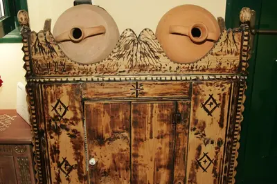 a wooden door with two hats on top of it at Dora's House in Ístrios