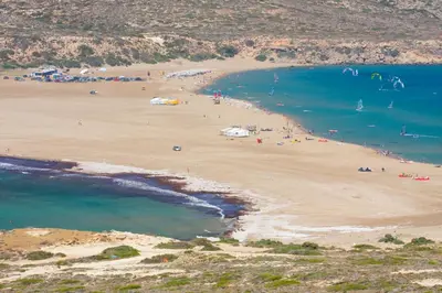 an aerial view of a beach with people in the water at Dora's House in Ístrios