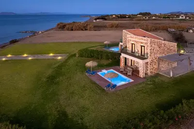 an aerial view of a house with a swimming pool at Diagoras & Attalos Villas in Phanaes