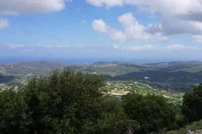 a view of the ocean from the top of a hill at Fontana Luxury Villa Salakos With Pool Near Beach in Sálakos