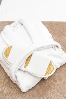 a stack of white towels on the floor at Villa il Vecchio Cortile in Rhodes Town