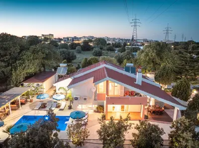 an aerial view of a house with a swimming pool at Artzy Villa in Rhodes Town