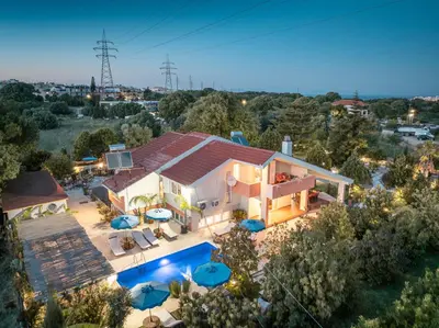 an aerial view of a house with a swimming pool at Artzy Villa in Rhodes Town