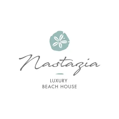 a sign for a beach house with a clover at Nastazia Luxury Beach House in Ialyssos