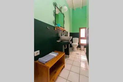 a bathroom with a sink and a toilet at Old Town House with Garden, Fully Equipped & Peaceful in Rhodes Town