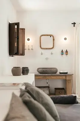 a bathroom with a sink and a mirror at Casita Casita Lindos - Adults Only in Líndos