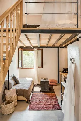 a bedroom with a loft bed and a staircase at Casita Casita Lindos - Adults Only in Líndos