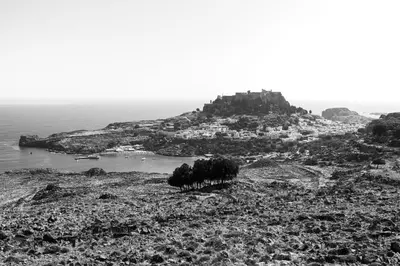 a black and white photo of an island in the ocean at Tesoro Del Mare in Pefki Rhodes