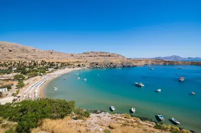 an aerial view of a beach with boats in the water at Lindian Ethos in Líndos