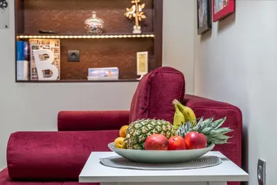 a bowl of fruit on top of a table at BIBLIOTHEQUE in Rhodes Town