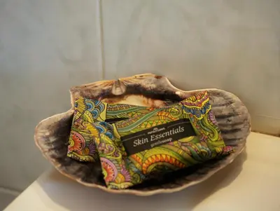 a bowl with a scarf on top of a table at the bougainvillea house in Symi