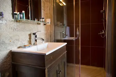 a bathroom with a sink and a shower at Mystic Hotel - Adults only in Rhodes Town