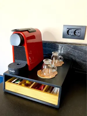 a red toaster sitting on top of a table at Grand Master Suite in Rhodes Town
