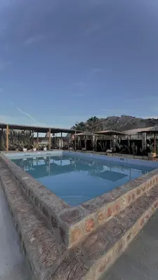 a large swimming pool in the middle of a building at LA Casa Di Lusso N4 - Adults Only in Kolimbia