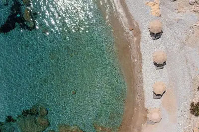 an aerial view of the beach and the water at Stone Luxury Suites - Adults Only in Archangelos