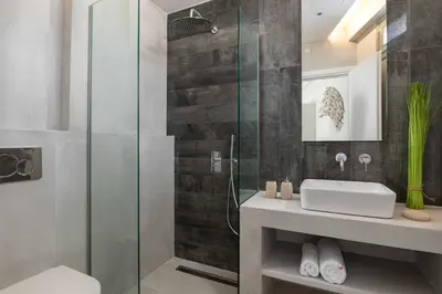 a bathroom with a sink and a shower at Mami`s House with Private Pool in Pefki Rhodes