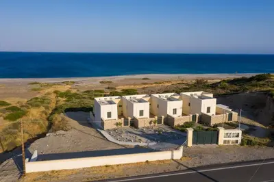 an aerial view of a house on the beach at House Almyra in Lachania