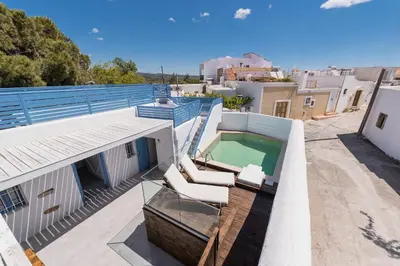 a view from the roof of a house with a swimming pool at Casa Blue in Gennadi