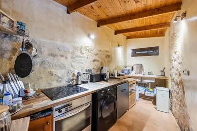 a kitchen with a sink and a stove at Casa de La Flora by Rhodes4vacation in Rhodes Town