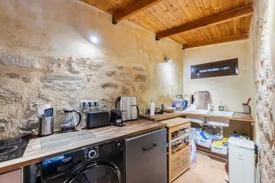 a kitchen with a dishwasher and a washer at Casa de La Flora by Rhodes4vacation in Rhodes Town