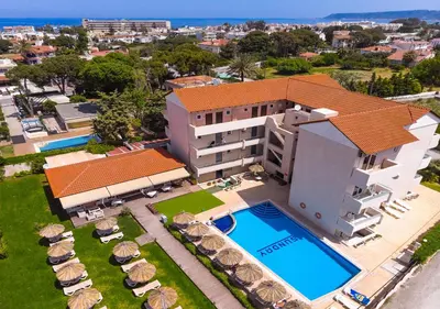 an aerial view of a villa with a swimming pool at Sunday Hotel in Ialyssos
