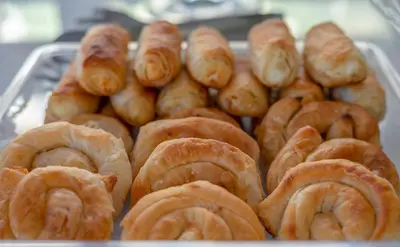 a bunch of donuts sitting on a tray at Sunday Hotel in Ialyssos