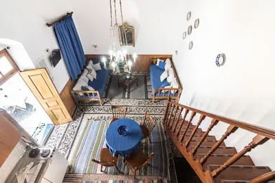 an overhead view of a living room with a table and chairs at Villa Mika in Líndos