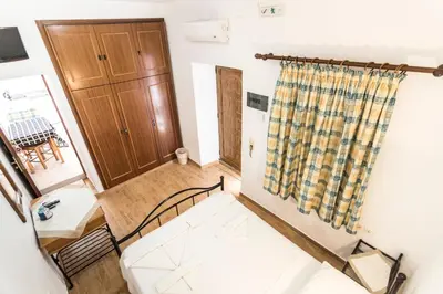 a view of a living room with a curtain at Villa Mika in Líndos