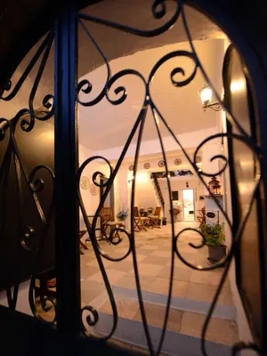 a view of a patio from a window of a building at Medieval Inn in Rhodes Town